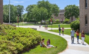 Students enjoying a spring day on the campus quad